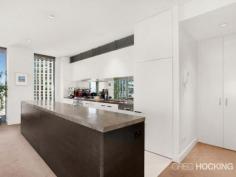 1912/1 Freshwater Place Southbank VIC 3006 Luxury corner apartment with 19th floor city backdrop - approx 92sqm Perched on the banks of the Yarra River in a prestigious resort style address, this flawless corner apartment embodies a sophisticated open gallery design with impressive proportions, exemplary finishes and floor-to-ceiling windows throughout. Captivating city views wraparound the spacious living and dining areas to create a supreme entertainers’ retreat of sheer opulence. An exquisite marble island kitchen serves as a grand space with stainless steel gas appliances and superior fittings. Residents enjoy access to a range of facilities on level 10 including a gymnasium, pool, spa, sauna, steam room, massage rooms and rooftop garden selection of barbecue amenities with a spectacular view. There are two generous bedrooms with built-in wardrobes, including the master retreat complete with walk through wardrobe and ultra-stylish ensuite. Additional highlights include a crisp white marble finished bathroom, ducted air conditioning, chic downlights, video intercom, concealed laundry facilities, secure car space and lift access. It presents a solid investment opportunity with high rental returns, or an impressive option for those seeking a prized lifestyle of supreme ... show more View Sold Properties for this Location View Auction Results General Features Property Type: Apartment Bedrooms: 2 Bathrooms: 2 Indoor Features Toilets: 2 Air Conditioning Outdoor Features Garage Spaces: 1 Swimming Pool - Inground Other Features Built-In Wardrobes,Close to Schools,Close to Shops,Close to Transport,Secure Parking Offers over $750,000