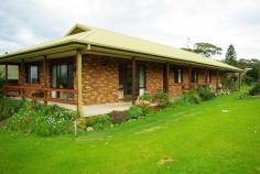 16 Welsh Street Bermagui NSW 2546 Retire In Stye - Brick Home - Convenient Location This Home Ticks All The Right Boxes. Magnificent Ocean and Mountain Views. Located in a convenient area close to Beaches, shops, Shorting Club and the popular Bermagui Harbour. Features of this quality family home include: Four good sized bedrooms, two bathrooms, spacious kitchen & family area, north facing formal lounge and dining room with stunning views to Haywards Beach and Dromedary - Gulaga Mountain. The covered verandah is ideal for alfresco entertaining and has a ramp at the front and rear doors for easy access (wheel chair friendly). Property Code: 403566376 View Sold Properties for this Location View Auction Results General Features Property Type: House Bedrooms: 4 Bathrooms: 2 Outdoor Features Garage Spaces: 1 $420,000