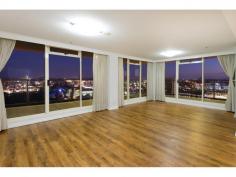 2403/132 Alice Street Brisbane City QLD 4000 Enviable Luxury Lifestyle - 174m2 Sub Penthouse in Quay West This exceptional Quay West property offers the ultimate luxury inner-city lifestyle with an outstanding location in the heart of the CBD, captivating vistas of the sparkling cityscape by night, and never-to-be-built out panoramic views of the Brisbane River, Botanical Gardens and the Kangaroo Point Cliffs by day. Experience elegant urban living with the very best of nature right on your doorstep - the lush Botanical Gardens are just 20 metres from your front entry. Located on the 24th floor of the prestigious Quay West Building, the rare combination of space, style, on-site facilities, and two car spaces, make this 174m2 sub-penthouse apartment the definitive statement for the discerning buyer. The spacious open-plan living and dining is framed with extensive glass windows and sliding doors, providing a spectacular panorama as a backdrop for stylish entertaining. The kitchen’s marble benchtops and quality European appliances are enhanced by a fabulous outlook over the river to Southbank. The balconies, measuring 29 metres in length, are accessible from all three bedrooms as well as the kitchen and living area, allowing you to make the most of our relaxed . General Features Property Type: Apartment Bedrooms: 3 Bathrooms: 2 Building Size: 218.00 m² (23 squares) approx Indoor Features Gym Built-in Wardrobes Dishwasher Ducted Heating Ducted Cooling Air Conditioning Outdoor Features Remote Garage Secure Parking Garage Spaces: 2 Balcony Deck Outdoor Entertaining Area Outside Spa Swimming Pool - Inground Expressions of Interest Closed