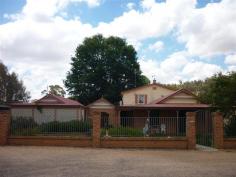 12 Crouch St Neville NSW 2799 $390,000 Property type: House Suburb: Neville (profile) Region: Regional NSW Land area: 5099 sqm LARGE FAMILY HOME WITH MANY EXTRAS Spacious accommodation for larger family or subdivided for peaceful lifestyle / investment. Offering a two story brick veneer residence with 4 bedrooms - 2 with ensuite, and 2 additional bathrooms all set on 5099sqm with attractive low maintenance garden at the front of the house and semi landscaped at rear. Add a modern spacious immaculate kitchen with Caesar stone bench tops, 2 drawer dishwasher with ample storage, separate dining room, lounge and bar, 3 interior entertainment areas – 1 with sunken hot tub, 2 offices/studies and 3 bay carport. A laundry with commercial washer and dryer completes this unique property. There are 3 AC units throughout with gas heating in family area and in-floor heating in the bathroom, kitchen and spa areas. There is a large workshop with 6 additional high sheds with a concrete floor suitable for a variety of hobbies and an outside room perfect for grandma / teenager / music / craft. The list is endless for this property & we highly recommend an inspection today! Features Air conditioning Alarm System Bath Dishwasher Ensuite Fireplace(s) Garden / Courtyard Gas Heating Indoor Spa Internal Laundry Pets allowed Secure Parking Separate Dining Room Shed Study 2010976115
