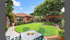 6 Nicholls Ave Haberfield NSW 2045 Quiet Sanctuary In Leafy Cul-de-sac Tastefully updated and extended yet retaining character appeal, this solid double brick Californian bungalow presents as an exceptional lifestyle choice. The floorplan is readily adaptable to the needs of a growing family, complete with generous formal/informal living areas, a modern kitchen and optional fifth bedroom. High ceilings and abundant light enhance the sense of space throughout, while a secure level garden at the rear features a large pergola for entertaining. The home also has great storage and ample off street parking including a carport. Set on 613sqm in a prized cul-de-sac, it promises quiet convenience within easy walking distance of Haberfield village shops and cafes, Summer Hill Station, Leichhardt MarketPlace, excellent schools, city buses and the light rail.