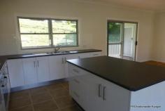 55 Colin St Kyogle NSW 2474 Buy new, and anyone - not just first home buyers can take advantage of the concessions on stamp duty ($5,000) for newly constructed homes. First home buyers also receive $15,000 from the NSW government (First Home Owner Grant (New Homes) scheme). Set in a quiet and private cul-de-sac, this quality home built by award winning home builder has lots to offer. Open plan living, kitchen and dining area, other rooms encompass 3 large bedrooms all with built-in and ceiling fans, spacious laundry with access to outside via the rear deck and a three way bathroom with double vanity. Added bonuses and a real feature of this quality home is the outside living areas, three separate decks provide a choice of areas to soak up the morning or afternoon sun and enjoy outdoor living in any weather conditions. Other highlights of the property include solar hot water, rain water tanks, under home parking, garden locker for the tools and a large subdividable block. Rarely does such an opportunity present itself to acquire a brand new home at the cost of an established home
