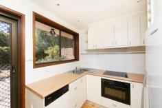 63 Dugdale St Cook ACT 2614 "Blank Canvas Single Level Townhouse" Looking for investing in your own two bedroom townhouse ? Looking at down-sizing, all on one level ? Looking as a first home owner ? Look no further, we have the perfect solution. This single level, two bedroom townhouse is awaiting the shrewd buyer, who wishes to add their creative touch and flair. Freshly painted, newly lacquered pine floors, well designed and equipped kitchen, are only a few of the surprises that await your imagination. Inspection a must for those who know the benefits of Cook. Open plan kitchen lounge dining rooms. Well appointed kitchen with Miele 45cm dishwasher, Miele combination oven / microwave and a Fisher & Paykel fridge / freezer. Original bathroom with shower and bath Brand new Fujitsu inverter heating and cooling system. Single garage with separate laundry. Leafy and private paved courtyard. Quiet complex in bush surroundings. Inspect today and discover why Cook continues to be one of Belconnen's most desirable suburbs - you could even sell the car given the close proximity to the Jamison Plaza and short bus/bike trip to North Canberra's major facilities including CISAC, Canberra University, ANU and the Belconnen Town Centre. Other features: Built-In Wardrobes,Close to Schools,Close to Shops,Close to Transport,Garden
