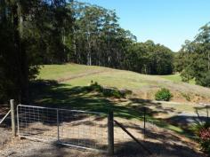 This nicely elevated 6,443 sq.mtr. block has plenty to offer. There is a
great building site overlooking the land and it is nicely set back from
the road. There is also a dam for extra water and the block is in a
rural setting but less than 10 minutes from the main Bruce Highway.
Another feature is that the building site overlooks a lovely rural
setting.