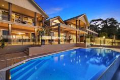 26-28 Daley Avenue Daleys Point NSW 2257 Exquisite World Class Waterfront Estate Introducing Paradiso Sul Mare, unrivalled in its dedication to opulence, this stately residence offers the ultimate in waterfront living. Wrapped in spectacular panoramas and set on almost half an acre in a magnificent North facing position, the superbly appointed home offers every conceivable luxury. With finely crafted custom fixtures sourced from exotic locations around the globe, this property is absolutely superior in quality and architectural brilliance!! The home was built to exacting standards and boasts a solid concrete construction just like a commercial development, phenomenal granite counter tops and exquisite Italian marble floors. The home is immense with over 690 square metres of floor space spread over 4 levels. A few of the grand features include massive vaulted ceilings with mezzanine areas, an elegant staircase with Jarrah hand rails (a bit like the one in "Gone With The Wind"), 6 spacious bedrooms including the most decadent master suite with spa bath, several private balconies overlooking The Brisbane Waters, lavish cinema room with wet bar and an opulent fully lined Jarrah office. This one of a kind masterpiece built by the team that became ... show more View Sold Properties for this Location View Auction Results General Features Property Type: House Bedrooms: 6 Bathrooms: 5 Land Size: 2018 m² (approx) Outdoor Features Garage Spaces: 4 Just Listed