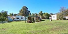 Gidgegannup WA, 6083 NOT YOUR AVERAGE 5 ACRE PROPERTY Interesting and versatile this 5 acre property on the western side of Roland Road is just ten minutes to Midland and five to the Roe Highway. Previously operating as a woodyard, the property has a number of potential uses under its current zoning. The 3 x 1 home is airconditioned, spacious (222m2 under main roof) with an extra WC, generous living areas and lots of shady spots to sit outside. It is attractively decorated and set amongst lush tropical gardens which are irrigated from the large dam. One of the bedrooms has been converted to an office with its own separate entrance. A games room with bar leads out to a covered barbecue area a real man's cave for those who love entertaining! It has a serviceable workshop with extra lean to section plus big open fronted farm shed and various smaller outbuildings. Not to mention the huge American Barn style shed which has been set up as an entertainment venue complete with bar and stage bring on the Karaoke! There are also two bores (only one of which is currently plumbed) with good quality water and a smaller spring fed dam with its own tiny jetty. The land is soft and suitable for horses or ponies and there are a number of aviaries which would remain on site for the bird lover. This is an interesting and unique property set right at the gateway to Gidgegannup and inspection will not disappoint.
