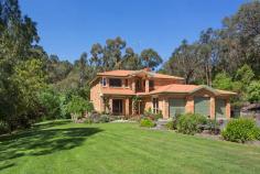 298-300 Oban Road Donvale VIC 3111 Tranquil and secluded on private acreage At first glorious sight, the dramatic gumtree backdrop to this peacefully private 2 acre (approx. 7,928 sqm) property highlights the very essence of Donvale's privileged lifestyle. Once inside, this 4 bedroom family home's functional floor plan embraces today's indoor/outdoor lifestyle. Enjoy expansive living and family areas that flow through to a huge north-facing deck. It is here that this property truly comes alive! Upstairs houses all 4 bedrooms with stunning treetop vistas from all vantage points. This is sensational living in the perfect location. * 4 large bedrooms with BIR, main with WIR and en suite with spa * Moments from Eastlink, Eastland Shopping Centre, schools, transport * Formal, light and bright living room and formal dining room * Expansive north-facing al fresco with Merbau decking overlooking stream * Gourmet kitchen with Blanco appliances and granite benchtops * Rumpus/pool room with built-in bar, large study/sewing room * Polished floorboards, chic tiling, carpeted bedrooms * Ducted heating, evaporative cooling, ducted vacuum system * Triple lock-up garage and workshop with internal access * Landscaped gardens and ... show more View Sold Properties for this Location View Auction Results General Features Property Type: House Bedrooms: 4 Bathrooms: 2 Indoor Features Study Outdoor Features Carport Spaces: 3 $1,100,000 plus