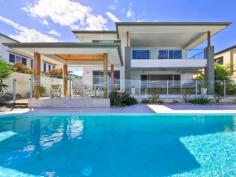 25 Windward Place Jacobs Well QLD 4208 A Magnificent Deep Waterfront Residence at Calypso Bay - Jacobs Well Put simply this is one of the best quality residences for the price on the market today in this beautiful estate. With its elegant and architectural design and open plan living, this superb waterfront home approx 60 square is located between Cold Coast City and Brisbane offers a tranquil and luxury lifestyle with easy access to Morton Bay and the islands such as Jumpinpin, Crusoe Island and the popular Broadwater & the M1 freeway. * 4 spacious bedrooms, 4 bathrooms & office * Formal and informal living areas plus upstairs living room * Large master suite with opulent ensuite, WIR * Media room with surround sound * High ceiling throughout, quality finishes throughout * Stunning kitchen with butler’s pantry & quality appliances * Ducted air con, security & vaccummaid, solar power * Stunning outdoor alfresco & entertaining area * Approx 12metre lap pool, gazebos * Land area 752m2 * 3 car garage plus storage * Approx 18metres of water frontage Be sure to inspect this beautiful home before it’s too late. With a local community of Calypso Bay, the hotel and shopping precinct only 5minutes away, Calypso marina ... show more View Sold Properties for this Location View Auction Results General Features Property Type: House Bedrooms: 4 Bathrooms: 4 Land Size: 752 m² (approx) Indoor Features Alarm System Intercom Built-in Wardrobes Ducted Vacuum System Air Conditioning Outdoor Features Garage Spaces: 3 Balcony Courtyard Fully Fenced Swimming Pool - Inground $1,450,000