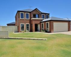 24 Brennan Promenade Baldivis WA 6171 But wait..... there's more...... Open the door to this home and see luxurious open plan living spaces and impressive design features throughout, this home has been designed for a growing family in mind. The ground floor open plan living area is all about relaxing and entertaining in style, with a kitchen featuring walk-in pantry, and stainless steel double size electric oven with gas hotplate, dishwasher & plenty of bench space. The connecting living and dining area flows seamlessly to an outdoor living space with awning, perfect for any social occasion, while overlooking the solar heated pool with stunning water feature as its back drop. Outside you will also find a low maintenance garden, with rain tank, liquid limestone flooring and 4x3 work shed with 4 metre side access which give you ample space for boats, caravan etc The expansive master bedroom is a peaceful parents' retreat with its own spacious walk-in his/her wardrobe and a generous ensuite including double shower heads, twin vanity and separate WC. The ground floor also features a theatre room, large study which could also be use as a 5th bedroom a large laundry with walk in linen closet and bathroom. The second floor is ready to accommodate younger members of the family with 3 large bedrooms, all with mirrored built-in robes and large bathroom, as well as a welcoming teenage retreat/games area with a balcony overlooking Bocce Park with unobstructed views to the Darling Ranges and double linen cupboard space. With so much consideration given to storage, space, style and separate living zones, this is "THE SUMMER" home every modern family will enjoy for years to come.