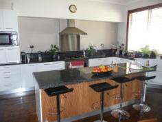 1848 Horsham Road, Noradjuha via, HORSHAM VIC 3400 $285,000 Completely renovated home situated on 0.6 ha (1.5 acres) at Noradjuha. Virtually a new home with an enormous wow factor. 3 bedrooms all with built in robes, open plan living area featuring designer kitchen with gas cook top, electric oven, dishwasher, granite bench tops, double sink and island bench, the swishest bathroom with glass shower, double vanity and bath, laundry, two toilets, large covered alfresco area and double carport. Feature quality Smeg appliances, polished floor boards throughout, wood heater, ducted air conditioning and is fully insulated. A 5 to 6 star energy rated home. 10m x 7m lock up shed with concrete floor, mains water connected plus 67,500 litres of rainwater storage.