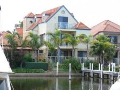 15 King St Paynesville VIC 3880 LUXURY VILLA ON THE CANAL IN DOWNTOWN LOCALEHere is one of the best waterfront villas available on the canals. Stunning architect design, 30 + square living, double jetty, waterviews from most rooms, fully furnished, three stories, waterview deck/balconies on all levels and located close to the shops and restaurants. Ground floor offers large open plan living with large kitchen which opens onto a timber waterfront deck, TV room, bedroom, bathroom and 2 garages. Second level offers a large pool room/open plan living, two bedrooms, bathroom and waterview balcony. Third level offers large master bedroom with balcony and luxurious ensuite with spa. Quality fixtures and fittings throughout, gas log fires (2) and split systems (3).