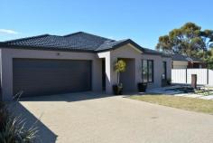 93 Malone Boort VIC 3537 Excellent Value For Money This 297m2 four-bedroom 2 bathroom brick veneer home on 1000 square mtr block is complimented by other new homes either side, in the beautiful township of Boort. Dennis family homes pride themselves on great layouts and great workmanship. This house is a wonderful example of both. Just four years old, this home is well-established and very convenient for any size family, with two living areas, spacious kitchen, loads of dining space opening directly onto alfresco entertaining and easy care gardens. All bedrooms have walk-in robes and are carpeted. Comfortable and convenient with split system heating and cooling. Double under roof garage with the added extra bonus is the 120m x 6m colourbond lockup shed with concrete floor and power connected. Located close to the schools and hospital, shops and Lake Boort. Unsurpassed value for money. If country town life is for you, why not explore this possibility. Due diligence checklist- for home and residential property buyer- http://www.consumer.vic.gov.au/duediligencechecklist. View Sold Properties for this Location View Auction Results General Features Property Type: House Bedrooms: 4 Bathrooms: 2 Building Size: 297.00 m² (32 squares) approx Land Size: 1000 m² (approx) Price per m²: $379 Indoor Features Ensuite: 1 Living Areas: 2 Toilets: 2 Study Broadband Internet Available Built-in Wardrobes Dishwasher Ducted Heating Ducted Cooling Outdoor Features Remote Garage Secure Parking Carport Spaces: 2 Open Car Spaces: 2 Outdoor Entertaining Area Shed Fully Fenced $379,000