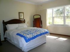 30 Ellenwood Avenue, CHARLTON VIC 3525 Nestled in the bend of the Avoca River this property offers wonderful lifestyle features - * Set on 21.5 acres of land adjoing the town common of over 50 acres & Charlton Pony Club facilities, a rural outlook less than 1km from the town centre of Charlton. * Comfortable & spacious 4BR / 2 bathroom home in established parklike garden surrounds. * Generous indoor & outdoor entertaining areas * Double garage, lock-up workshop and undercover stables with 3 loose boxes * The additional acreage provides a lasered area always pencilled for a dressage ring * Comprising 4 separate titles, lot tender options available