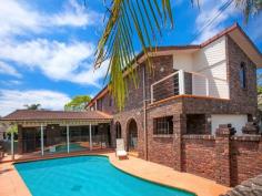 12 Stirling Place Belrose NSW 2085 For Sale Offers Over $1,350,000 Features General Features Property Type: House Bedrooms: 5 Bathrooms: 3 Land Size: 696 m² (approx) Outdoor Garage Spaces: 2 Inspections Sat, 08 Nov 11:00 AM - 11:30 AM Nestled at the crest of a peaceful child friendly cul de sac, this surprisingly spacious brick residence provides for an effortless entertaining lifestyle in a family friendly package incorporating a seamless floor plan specifically designed to maximise the use of multiple indoor and outdoor living areas for your optimum enjoyment. Attractive established greenery lines the path toward the tiled entrance which delivers you into a welcoming foyer greeting your arrival home. Awaiting is a large modern kitchen, boasting integrated stainless steel appliances, a 900mm gas cook top, handy casual dining bar and a walk in pantry. Flowing seamlessly from this hub is the ample family living area, featuring polished timber flooring, ideally opening through glass sliders to the covered contemporary alfresco entertaining deck, beautifully bound by the glorious sun soaked child friendly grassed yard, itself framed by low maintenance gardens. Opening from the family is the spacious separate dining, also conveniently opening to the rear. Extending beyond this living is a versatile rumpus room, overlooking the yard, which opens to a further paved courtyard. Adjacent is the substantial air conditioned lounge, with ambient pitched ceilings and a full wet bar, with double glass sliders providing a seamless transition to an additional covered outdoor living area, with a built in BBQ, opening to the sparkling solar heated pool. Completing the lower level is a handy full guest bathroom boasting convenient access to the pool area. Designed to generously accommodate the family are 4 double bedrooms, all with well appointed built in robes, including the grand master suite which offers glass sliders opening to a private balcony, a large walk in robe and a modern ensuite with heated towels rails. Complementing the ensuite is the upper level main bathroom which ideally features a separate bath, shower and toilet. In addition there is a versatile 5th bedroom or optional home office, plus another spacious light filled living area, perfect for a parent or teen retreat. Adding further appeal to this outstanding family home is the ducted air conditioning on the upper level, gas heating outlets, electricity rebated solar panels, a big utility room with external access and the double automatic garaging with mezzanine storage and internal access.
