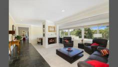 318A Pittwater Rd East Ryde NSW 2113 IDYLLIC FAMILY RESIDENCE Spread over one impressive level, this stunning family residence enjoys a sequence of indoor and outdoor living zones, with an enticing layout for those who love to entertain. Beautifully presented interiors offer immediate enjoyment, with a sparkling swimming pool taking centre stage outdoors. Set against an idyllic backdrop this elevated position enjoys serene north east views over Lane Cove National Park, with Ryde East Public School, transport and Macquarie Hospital close by. - Expansive living areas, formal lounge room - Master with walk-in robe, ensuite & adjoining spa room - Private parents retreat with separate cedar lined spa room, featuring 8 jet in-built spa - Premium Caesarstone kitchen with stainless steel appliances - Chic bathrooms, home office - Large billiards room/library, air conditioning - Glass fenced pool with travertine surrounds, tropical gardens, alfresco deck - Double lock up garage plus two car spaces ** Agent's interest ** For further information please contact Paul Nees 0432 995 847 or Alex Banning 0434 131 903, Ray White Lane Cove 9428 4100