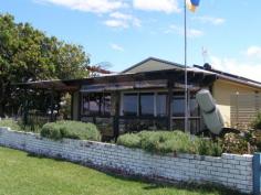54 Haiser Road, GREENWELL POINT Recently refurbished charming four bedroom on the Crookhaven River waterfront reserve
* The private front courtyard is a tranquil getaway from the hustle and bustle of modern life
* The delightful open plan kitchen, dining and lounge room have polished floorboards & R/C air
* The living area flows to the perfect entertainment deck with magnificent waterviews
* An inviting central hallway joins the rear of the house to three courtyards and the living areas
* The house is bagged brick, has a new iron roof, solar hot water and electricity
* A carport is attached to the single garage with a large workshop area for the handyman