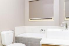 4/3 Redwood Drive HOPPERS CROSSING VIC 3029 For Sale $265,000 to $285,000 Situated in a popular Hoppers Crossing location this lovely unit is perfect for the downsizer or investor. Boasting 2 spacious bedrooms with built in robes and bathroom, separate lounge area and kitchen/meals, the living areas are tiled and the bedrooms are carpeted. The kitchen has stainless steel appliances and ample cupboard and bench space and is complimented by the neutral colour scheme throughout, nice ceilings give a sense of space and a low maintenance backyard really adds to the appeal. Add to all of this split system cooling and heating, quality blinds and fittings and a single garage with remote. Currently tenanted and returning $1173.00 per calendar month.