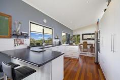 Acreage Semi-rural - BLACK MOUNTAIN QLD Set
in one of Black Mountains most sought after pockets on 1.98ha (approx. 5
acres) this stunning home will impress. Set high capturing the breeze
with an abundance of privacy, stunning skyline panoramas, level entrance
to the home with deep elevated covered decks for entertaining.
Immaculately presented 10.5 year old home, extra high ceilings with
skillion roof, polished timber floors in open plan living/dining areas,
double sliding doors providing direct access to large covered deck
perfect for al-fresco entertaining. Central stylish kitchen with
breakfast bar, stainless oven, heaps of storage and views to inspire the
cook in you. Four good size bedrooms all with built-in robes and the
master retreat with an en-suite, fans in all the rooms. Extras include
solar hot water, 20,000 gallon water tank, 2 dams, full boundary
fencing, steel frame, shadow cladding on the outside with iron roof,
double carport, full wall linen cupboard, enclosed laundry. Great
views and beautiful sunsets. Five minutes drive to Cooroy or Pomona
and approximately 30 minutes to Noosa beaches and restaurants. Ref: 507