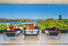 2 Rawson Rd Rose Bay NSW 2029 Dress circle positioned in an exclusive harbourside enclave, this
glamorous low maintenance residence captures point-blank panoramic views
of the world's most beautiful harbour-city. Offering contemporary
pavilion-style architecture opening to expansive terraces &
sculptural courtyard gardens, the generous 3-storey indoor/outdoor
lifestyle combines cutting-edge designer luxury with sunny privacy &
postcard-perfect views. The home & the views are spectacular from the first impression to the last Oversized front door opens to large double height central reception foyer Enormous open plan living & dining areas spill out to full length terrace Stone steel gas entertaining kitchen, breakfast island, European appliances, integrated fridge/freezer 2 travertine courtyard gardens (with outdoor kitchen) adjoin living/dining Fully appointed separate home-cinema, separate fully fitted study/office 4 large bedrooms, bespoke wardrobes, 4 travertine ensuite bathrooms High ceilings, travertine guest powder room, internal laundry, wine cellar Wall to wall glass, motorised blinds, ducted A/C, heated travertine floors 4-car garage (internal access), abundant storage throughout the home Versatile floorplan, generous proportions, exceptional attention to details Convenient to excellent private schools, shopping villages, marinas, parks * Co Agent Wayne Yates 0412 296 101 Laing+Simmons Double Bay