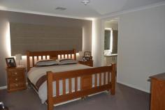 93 Malone Boort VIC 3537 Excellent Value For Money This 297m2 four-bedroom 2 bathroom brick veneer home on 1000 square mtr block is complimented by other new homes either side, in the beautiful township of Boort. Dennis family homes pride themselves on great layouts and great workmanship. This house is a wonderful example of both. Just four years old, this home is well-established and very convenient for any size family, with two living areas, spacious kitchen, loads of dining space opening directly onto alfresco entertaining and easy care gardens. All bedrooms have walk-in robes and are carpeted. Comfortable and convenient with split system heating and cooling. Double under roof garage with the added extra bonus is the 120m x 6m colourbond lockup shed with concrete floor and power connected. Located close to the schools and hospital, shops and Lake Boort. Unsurpassed value for money. If country town life is for you, why not explore this possibility. Due diligence checklist- for home and residential property buyer- http://www.consumer.vic.gov.au/duediligencechecklist. View Sold Properties for this Location View Auction Results General Features Property Type: House Bedrooms: 4 Bathrooms: 2 Building Size: 297.00 m² (32 squares) approx Land Size: 1000 m² (approx) Price per m²: $379 Indoor Features Ensuite: 1 Living Areas: 2 Toilets: 2 Study Broadband Internet Available Built-in Wardrobes Dishwasher Ducted Heating Ducted Cooling Outdoor Features Remote Garage Secure Parking Carport Spaces: 2 Open Car Spaces: 2 Outdoor Entertaining Area Shed Fully Fenced $379,000