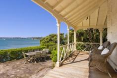 11 Holbrook Ave Kirribilli NSW 2061 Lifestyle - Built circa 1857, this historic waterfront estate,
'Sunnyside', is one of Sydney's finest properties, occupying a prime
location on Sydney Harbour. This iconic landmark boasts a long history
of pedigreed owners and comes onto the market after 43 years. Nestled
amid 1250 sqm of beautiful gardens on the tip of the Kirribilli
peninsula, it's immensely private with superb boating facilities. The
meticulously and respectfully restored and updated sandstone home
captures gun barrel views down the harbour past Fort Denison to Shark
Island and Vaucluse.
Accommodation - Retaining enormous traditional appeal, the expansive
two-storey residence contains four large bedrooms, including a huge
master suite with a private study, along with two luxurious Carrara
marble bathrooms. An abundant choice of entertaining space includes
grand formal lounge and dining rooms, an elegant sitting room and a
casual living area with soaring ceilings, encompassing a bespoke
travertine Miele gas kitchen. A spacious office is privately secluded
among the gardens.
Features - Located just 50m from the ferry which takes you to Circular
Quay in only seven minutes, the property enjoys use of a shared jetty
plus a private electric boat hoist and tie-up area. Framed by wide,
shady verandas and pretty sandstone-flagged terraces