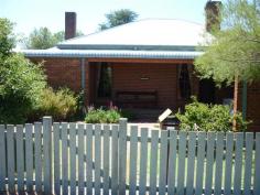 1 Church Street Blayney NSW 2799 $350,000 Property type: House Suburb: Blayney (profile) Region: Regional NSW Land area: 910 sqm CHARM & ELEGANCE Solid double brick home tastefully renovated in Federation Style situated on 910sqm corner block. Walking distance to schools and sporting facilities and all town amenities. There are 3 large bedrooms, 1 with beautiful wooden built-ins. A formal sitting room with open fireplace and an office/library tempting an extra bedroom space. Charming wooden kitchen opening onto the dining/lounge room perfect for entertaining with choice of romantic pot belly stove or instant gas heating. Renovated bathroom retains original cast iron clawfoot bath with a stain glass window feature. A lovely family style yard, fully fenced with established gardens and double carport. This home is perfectly presented and is a must see for those seeking comfort and convenience. Features Bath Broadband internet access Built in wardrobes Dishwasher Fireplace(s) Fully fenced Garden / Courtyard Gas Heating Internal Laundry Separate Dining Room 2010953280
