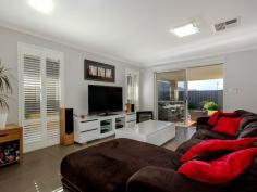 51 Rubens Circuit Baldivis WA 6171 SIMPLY STUNNING HOME!! It is always a pleasure to bring to the market a home that is beautifully presented inside and out and this particular home is no exception! This four bedroom, two bathroom home is not only stylish and sophisticated, but also a smart investment! No expense has been spared on the quality fixtures and fittings that are evident as soon as you enter this stunning home. At the front of the home is a fabulous home theatre room where you can relax and unwind. The stunning master suite, sports an enviable His and Hers walk-in robe and an elegant ensuite with a double vanity and stylish twin square basins. The remaining three bedrooms are a good size and have been tastefully decorated. The chic modern kitchen with stone bench tops has quality 900mm appliances and stylish feature lighting in the dining area, which flows through to the open plan living space. Here there are neutral tones which add to the sophistication of this beautifully styled home, with the finishing touches of white timber shutters which are prominent throughout the home. This light filled room leads out to the timber decked outdoor entertaining area which is the . General Features Property Type: House Bedrooms: 4 Bathrooms: 2 Land Size: 390 m² (approx) Indoor Features Toilets: 2 Alarm System Air Conditioning Outdoor Features Garage Spaces: 2 Other Features Built-In Wardrobes,Close to Schools,Close to Shops,Close to Transport,Garden From $429,000