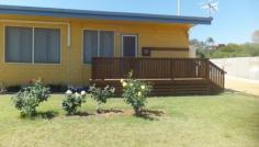 13 Hubble St South Carnarvon WA 6701 A MUST TO INSPECT Three bedroom block residence with airconditioning in lounge, dining/kitchen, main bedroom and bedroom 2. The separate lounge is brightly decorated with ceiling fan and aircon plus vinyl floor coverings. The airconditioned main bedroom leads off from the lounge with ceiling fan and built in robes. The bathroom offers a shower recess, toilet and vanity with the laundry houses a second toilet. The spacious gallery kitchen has dishwasher, electric hot plates and electric wall oven and the hot water system is also electric. The welcoming front decking and the rear patio along with the immaculately presented terraced gardens and the 9 metre by 4 metre colour bond garage are a bonus to this well presented property. A must to view to appreciate. Other features: Garden,Secure Parking,Formal Lounge,Separate Dining