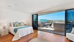 5 Highview Ave Queenscliff NSW 2096 An architectural triumph of the highest calibre, this as-new
contemporary masterwork leaves nothing undone in its quest to provide
the ultimate luxury retreat. Immersed in a sweeping 180 degree northerly
panorama with stunning ocean views, its premier headland setting is
within a few minutes stroll of the beach and village. Tri-level full brick residence with every conceivable luxury Vast open living, dining and family area with gas fireplace Glass bi-fold doors open to in/outdoor entertainers' deck Poolside family room with wet bar flows to covered patio Sophisticated Quantum Quartz island kitchen with butler's pantry Master suite with walk-in robe, ensuite and northerly deck Steam room, 3,000 bottle climate controlled wine cellar Chic bathrooms with heated underflooring, powder room Internal lift to all floors, Sydney red gum flooring, ducted air con Easycare garden with irrigation and automatic heated pool systems Stroll to Freshwater Beach and village, minutes from schools Double lock up garage, media centre, Dynalite smart system, comfort plus glass