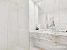 1912/1 Freshwater Place Southbank VIC 3006 Luxury corner apartment with 19th floor city backdrop - approx 92sqm Perched on the banks of the Yarra River in a prestigious resort style address, this flawless corner apartment embodies a sophisticated open gallery design with impressive proportions, exemplary finishes and floor-to-ceiling windows throughout. Captivating city views wraparound the spacious living and dining areas to create a supreme entertainers’ retreat of sheer opulence. An exquisite marble island kitchen serves as a grand space with stainless steel gas appliances and superior fittings. Residents enjoy access to a range of facilities on level 10 including a gymnasium, pool, spa, sauna, steam room, massage rooms and rooftop garden selection of barbecue amenities with a spectacular view. There are two generous bedrooms with built-in wardrobes, including the master retreat complete with walk through wardrobe and ultra-stylish ensuite. Additional highlights include a crisp white marble finished bathroom, ducted air conditioning, chic downlights, video intercom, concealed laundry facilities, secure car space and lift access. It presents a solid investment opportunity with high rental returns, or an impressive option for those seeking a prized lifestyle of supreme ... show more View Sold Properties for this Location View Auction Results General Features Property Type: Apartment Bedrooms: 2 Bathrooms: 2 Indoor Features Toilets: 2 Air Conditioning Outdoor Features Garage Spaces: 1 Swimming Pool - Inground Other Features Built-In Wardrobes,Close to Schools,Close to Shops,Close to Transport,Secure Parking Offers over $750,000