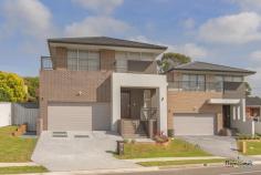 84A & 84B Kendall Drive Casula NSW 2170 2 Auction 22/11/14 at 2:00pm Two Brand New Architect Design Homes With Views! House - Property ID: 760310 These stunning split level homes are ideally situated in the Glen Regent Estate of Casula and feature spacious large open plan designs with outdoor alfresco entertaining areas too. - Tiled lounge, dining and family rooms with high ceilings - Stunning kitchens with stone bench tops, Gas cooktop and dishwasher - Main bedrooms feature big walk-in robes, balcony with stunning views, large en-suite and built-ins to all others - Ducted Air conditioning, Alarmed, Rainwater tanks and more - Auto Double garage with high ceilings and enough room to create mezzanine storage above - Fully fitted laundries and separate powder rooms downstairs A must to inspect, buy one or buy both, a rare opportunity and ready to move into today!
