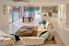 Broadbeach, Gold Coast QLD 4218 $2,150,000 Carmel house is a new contemporary designed home located in one of the most prestigious areas of Broadbeach Waters on the Gold Coast, Australia. This magnificent house is positioned on the wide water bend of the canal which opens to a 270 degree view of beautiful wide waterways. All fittings and finishes were completed with the owner’s highest quality requirements. The main features of the house includes: · Well-designed floor plan with careful consideration given to comfortable family living · Spacious open plan living and dining areas with the floor to ceiling windows which highlight the stunning water views · Luxurious kitchen with Ceasarstone bench top plus an impressive island bench with a quality dual sink, high quality Bosch appliances and six burner gas cooktop · Second living / sitting area which could be used as a formal lounge or home theatre · A well-appointed office with separate entrance away from the main living areas