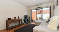 7/1A Wilkinson Street, Reservoir Vic 3073 A superb location that includes the tram and bus to the CBD, High Street, RMIT and La Trobe Uni virtually at the doorstep, cafes close by and Northland within easy reach enhances the appeal of this beautifully presented apartment. Offering a great first home or intelligent investment opportunity, you’ll discover spacious, climate controlled living anchored by a kitchen with stainless steel appliances and opening to a generous, private terrace large enough for entertaining guests. The bedroom with fitted robe sits adjacent to a super-sized bathroom complete with bath, shower and laundry facilities. With split system climate control, security intercom, car parking and storage cage, it’s entry-level excellence you don’t want to miss!