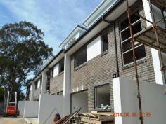  4/6 Kennington Oval Auburn NSW 2144 BRAND NEW TOWNHOUSE UNDER CONSTRUCTION AND WILL BE READY FOR OCCUPATION BY THE END OF OCTOBER 2014. Situated
 in one of Auburn's finest street. This superb town-house is a truly 
magnificent property with a host of quality features that will suit even
 the most anxious buyers. - 4 Bedrooms (3 with built-in-robes) - Master room and second bedroom are with ensuites. - Kitchen with gas cooking. - Dishwasher, Stone bench-top and quality fixtures. - Combined lounge/dining. - Air-conditioner. - Up to ceiling Tiled. - 3 Bathrooms and 4 Toilets. - Double L.U Garage with storeroom. - Private courtyard. - Garage+ storeroom = 45m² - Living/Dining/Kitchen area = 63m² - 3 Bedrooms + bathroom + Ensuite = 60m² - 4th bedroom + ensuite = 41m² - Courtyard =65m² 