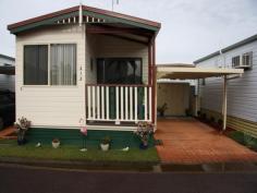 212 Palm Drive Spinnakers Leisure Park Belmont NSW 2280 URGENT SALE - Affordable sunny Cottage Look no further than this cosy low maintenance Manufactured home for your affordable home No renovating to do. Just move in. This low maintenance relocatable home is just 7 years young and would suit someone looking for a much smaller sized home and one to suit a lower budget. Perhaps you need a weekender or getaway home where you can enjoy Belmont’s idyllic lakeside location and be within an easy walk to Belmont’s large shopping precinct Features includes: 2 bedrooms Open plan living/dining /kitchen High ceilings and carpeting in living area and bedrooms Neat bathroom with shower, vanity and wc Vertical blinds and screens throughout Sunny front timber deck facing northwards Single carport with stamped concrete driveway Lawn locker at rear of carport with laundry inside. The Park features two swimming Pools, a Gym, proposed bowling green and a renovated Recreation room for social events for its residents. There are friendly on site Managers and many new homes currently being built in the Park. Remember, no stamp duty or legal fees payable when purchasing, so a big saving on the purchase. The reasonable weekly ... show more View Sold Properties for this Location View Auction Results General Features Property Type: Villa Bedrooms: 2 Bathrooms: 1 Outdoor Features Carport Spaces: 1 $90,000