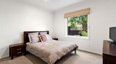 5/24 Dundas Street, Thornbury Vic 3071 Welcome to the renowned Dundas Place, an exclusive community of only ten premier residences so tightly-held and immaculately maintained – right at the most blue-chip heart of Thornbury. Enviably positioned at rear away from street frontage, enjoy the mesmerisingly tranquil ambience all around plus immediate access to a crystalline lap pool and lush barbecue pavilion amongst the stunning resort-style tropical backdrops. Spoil yourself with an extremely generous floorplan showcasing a voluminous living and dining area which flow seamlessly through custom bi-fold glass doors to an outdoor entertainer’s timber deck overlooking a sunlit alfresco patio and a pristinely groomed private courtyard. The open-plan gourmet kitchen boasts premium 4cm solid stone benches, a stylish chef’s island and state-of-the-art Blanco appliances, whilst the two deluxe bedrooms feature high-quality built-in wardrobes and gorgeous light-flooded garden views towards the east.