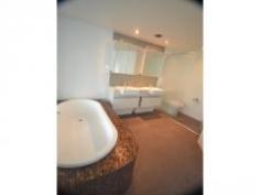 T20/20 Bayview Street Runaway Bay QLD 4216 Spacious Apartment Owner Wants Out!! Purchased for $750,000,will look at all reasonable offers in the $400,000's. This is your opportunity for a steal! The Harmony complex is a tranquil Broadwater sanctuary designed for relaxation and the laid-back Gold Coast lifestyle you thought was out of reach. Featuring three acres of mature sub-tropical gardens and private recreation facilities, this lush oasis is just 200 metres from the Broadwater and close to all you love about Runaway Bay. The site's landscaped gardens centre on an 18 metre lagoon pool and spa, tasteful meditation court and fire pit, which is lit each night. With your front door just 200 metres from the Broadwater and close to Runaway Bay, life at Harmony is full of sunset strolls, breakfast at coastal cafes and a run or cycle along the spectacular foreshore. Featuring: • 2 bedroom plus study. • A huge lounge room, light & airy • Spacious built-in wardrobes • Generous terrace/balcony facing north • Modern kitchen with European appliances • Plenty of cupboard space through-out • Secure parking for 2 cars • Tropical landscaping through-out the complex General Features Property Type: Unit Bedrooms: 2 Bathrooms: 2 Indoor Features Ensuite: 1 Living Areas: 1 Toilets: 2 Study Gym Built-in Wardrobes Dishwasher Air Conditioning Outdoor Features Remote Garage Secure Parking Garage Spaces: 2 Balcony Swimming Pool - Inground Offers Over $400,000