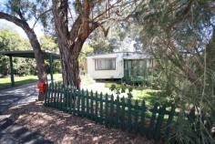 7 Lady William Court, Wantirna, VIC 3152 This relocatable home, situated at the Wantirna Caravan Park, 203 Mountain Hwy, Wantirna is complimented with extensive timber decking situated in a small court. Features open plan living plan, 2 bedrooms, kitchen with access to large undercover timber decking, dining area, lounge room with reversed cycle split system unit, single carport and more. Please note: the land is not for sale. Inspection strictly by appointment only. For more details: call John Katselas 0411 110 997 or Michael Jang 0417 288 899