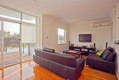 15/51 Tidewater Way Ascot WA 6104 $1,099,000
Magnificent tri-level home looking out over
the river to the reserve beyond. This is magic right here in Ascot only
15 mins to the city and 10 mins to the airport.
Spacious open plan lounge, dining, kitchen opening up to a marvellous
outdoor timber deck right on the river, watch the dolphins swim right
by.
Four bedrooms, two bathrooms, home in a secure complex. Outdoor
balconies on all levels overlooking the water with downtown Perth as a
backdrop.
Expansive family room with a large outdoor...