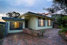 191 Mount Keira Rd Mt Keira NSW 2500 $557,000 UP HIGH IN THE HILLS House - Property ID: 747908 Set up high in the peaceful Mount Keira, this unique 4 bedroom house is being offered for the first time in 56 years and is looking for a new family to call it home! With warmer weather on the way, there are plenty of places to sit back, relax and take in the natural setting and gorgeous escarpment views or watch the kids play in the yard below. Features of this home include: - 4 large bedrooms upstairs - Main with room for incorporated study - 5th bedroom (teenager's retreat) or rumpus downstairs with access to own shower and toilet plus courtyard - Large, open lounge with polished timber floorboards and fireplace - Separate TV and dining rooms - Timber kitchen with dishwasher and stove included - Sun room and timber verandah to take in the gorgeous views - Large windows to take in the views with security mesh fly screens - Bathroom with spacious bath and separate toilet - Plenty of storage and bench space in the roomy laundry - Upstairs has been freshly painted - Huge, fully fenced leafy yard - Potential for a garage This property has plenty of potential and is situated on a 690 sqm block. Hidden features of this unique property include a large room with external access and internal access to courtyard and plenty of under house storage and a secret, secure 'workroom' down the side of the house. Properties like these are rare. Contact Robb Grubb from Professionals Wollongong on 0411 315 450, come along to one of our open home inspections and attend our Auction on Saturday 27th September, 2014 at 10am.