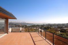 52 Blake Street Dover Heights NSW 2030 Dramatic Harbour-View Home with Pool Capturing magical Harbour Bridge and city skyline views from its superb vantage point, this striking contemporary home has been designed for large-scale family living and entertaining. Featuring a luxurious master suite with a dressing room and private balcony, a pool and low-maintenance alfresco space, it's close to local village shops, parkland and schools. - Chic main suite with opulent spa ensuite - Sun-soaked northerly terrace with a pool - Vast glass-embraced living and dining area - Open marble kitchen, 2nd commercial kitchen - Spacious study, intercom, abundant storage - Luxurious mosaic tiled main bath with spa - Ducted a/c, DLUG with level internal access View Sold Properties for this Location View Auction Results General Features Property Type: House Bedrooms: 5 Bathrooms: 4 Outdoor Features Garage Spaces: 2 Forthcoming Auction