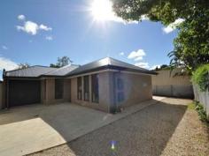 21 Tolmer Rd Elizabeth Park SA 5113 Near new court your home ready for a new owner.
Why pay rent when you can buy? Priced to sell!
Great investment, currently tenanted at $300.00 per week.
The home offers three bedrooms all with built in robes, master
bedroom is serviced by a two way bathroom and the property has a second
toilet. The large open plan living is of a good size with tiled
floors to make cleaning so easy and of course carpet to all bedrooms.
Ducted Inverter Mitsubishi Reverse Cycle Airconditioning. Energy saving
compact fluro down lights through out.
This property is set on a hammer head block with a high retaining
wall and fencing for extra security and privacy. Automated security
outside lighting adds to that extra security. Enjoy this property with its low maintenance garden.
Contact Beverley Philpott Ph 0414 880 001 RLA 46442