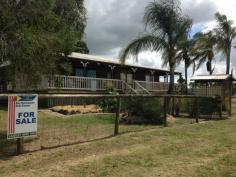49 Keanes Road Rosewood QLD 4340 Timber Home on 10 Acres Bring Your Horses! Set on a 10 acre block just outside of Rosewood features this well presented - 3 Bedroom Timber Home. Ideal for the family with horses, this home boasts : - Three bedrooms + study - Large open plan living area with wood heater - Bedrooms with Built ins & Carpet - 2 Way Bathroom with Separate Bath & Shower - Full length decks - front & back - Large 4 Bay Machinery / Hay Shed - Horse Stable - Wooden Cattle Yards - Water: Dam, Bore & Tank Water - Only a short drive into town & schools All this on a Fully Fenced 10 Acre Block. Currently Tenanted for $450 p/w. Call to Book an Appointment Today Property Code: 1381 General Features Property Type: Acreage/Semi-Rural Bedrooms: 3 Bathrooms: 1 Land Size: 4.04ha (9.98 acres) (approx) Price per acre: $40,080 Outdoor Features Carport Spaces: 2 Garage Spaces: 1 Other Features Deck, Verandah, Outdoor entertainment area, Undercover outdoor area, Fenced, Low maintenance $400,000