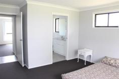7 Neotsfield Avenue Gloucester NSW 2422 With a commanding presence over the land, this impressive brand new 4 bedroom home incorporates generous room sizes and quality inclusions. Situated on a 1 acre block with northerly aspect, the yard is established with semi-mature trees and substantial timber post & rail fence along the road frontage. Landscaped gardens frame the distant rural views from inside the home. Informal living and kitchen area open out to a level rear yard ideal for entertaining or a great play area for the younger members of the family. Kitchen is fitted with stainless steel appliances and features spacious benchtops with glass splashback, walk-in pantry and 5 burner free-standing gas cooktop/oven. A powder room is located off the living area with the bedrooms having access to a 3-way bathroom and ensuite off the main bedroom. Ducted air conditioning provides comfort throughout all year round. The attention to detail in the planning & construction of this home will be evident to all that inspect this property. For Sale: $630,000