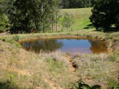 This nicely elevated 6,443 sq.mtr. block has plenty to offer. There is a
great building site overlooking the land and it is nicely set back from
the road. There is also a dam for extra water and the block is in a
rural setting but less than 10 minutes from the main Bruce Highway.
Another feature is that the building site overlooks a lovely rural
setting.