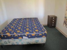12 Morton St Merredin WA 6415 REDUCED!!! Clad (face) brick & tile cosy home on a large (1100 square meter) corner block. The lounge room features a split system air conditioner and leads onto the small front porch. A good sized kitchen with heaps of cupboard space and gas oven and stove. Three reasonable sized bedrooms and a neat bathroom with shower over the bath tub. Single carport and small garden shed in rear yard plus a small patio area of the laundry. Currently leased for $240 per week (12 months lease) fully furnished, this property makes a good rental investment property. Easy maintenance yards with minimal gardens and rear yard undeveloped so you can set it up however you would like. Contact our office on 9574 2917 and speak to Tiffany or Tony for further information on this property or to arrange an appointment to view the property.