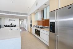 17/11 Halls Head Parade Halls Head WA 6210 Offers Over $1,000,000 LUXURY PENTHOUSE PANORAMA OPEN BY APPOINTMENT ALL WEEKEND! Live the ultimate beach lifestyle in this luxurious penthouse apartment located in the prestigious Old Halls Head. Enjoy panoramic views up the coast and across to Mandurah Marina from the huge entertainers balcony. The unique apartment is fitted out using only the highest quality fixtures and fittings, and a well designed floorplan with high ceilings and wooden floorboards complete the feel. The designer chef's kitchen overlooks the open plan living area and has an abundance of cupboards, Miele appliances, a built in coffee machine and microwave, and is finished off with Corian benchtops. The floor to ceiling windows and sliding doors take in the expansive views and are finished with remote controlled blinds. A separate and cosy theatre room is adjacent to the main living area and features a Mitsubishi projector, big screen and Bose surround sound. Relax in the hotel style master suite with an impressive open ensuite, freestanding bathtub, twin vanities and waterfall style shower. Open up the curtains and you have direct access to the balcony through sliding doors. All the bathrooms are all finished off with Corian benchtops. The guest suite has its own private ensuite and double sliding wardrobes and the third bedroom has access to a guest bathroom. The property also features Daikin reverse cycle airconditioning, a gym, alarm system and secure parking for three cars. Also conveniently located above a Dome cafe and across the road from the popular Doddies Beach, this apartment is a must view. Call Exclusive Listing Agents Daniel & Chelsey for a private inspection on 9550 2027 or 0418 883 535.