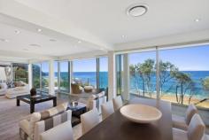 14 S Scenic Rd Forresters Beach NSW 2260 Per night: $650 to $1,300 Per week: $4,000 to $8,500 Maximum adults sleeps 8 Total adults & children sleeps 8 Bond required | Linen included
This architect designed tri-level beachfront is absolutely
spectacular. From the moment you enter its front door you will fall in
love with Sea Dream. The ultimate entertainer's delight Sea Dream is the
perfect retreat for family groups. Featuring floor-to-ceiling windows,
seamless indoor/outdoor living, multiple sitting areas and living spaces
including kid's room, and two full kitchens, this holiday home offers
the perfect retreat for family groups. Be amazed by the panoramic views
that await you and enjoy super spacious interiors, ultra modern
finishes, high ceilings and travertine tiling throughout. Take in fresh
ocean breeze and wonderful outlook from all levels of this amazing
house. Master bedroom contains a king bed, balcony with panoramic views,
walk-in robe and en suite with corner spa, shower and views. Bedroom 2
contains a king bed with built-ins and balcony. Bedroom 3 contains a
queen bed and built-ins. Bedroom 4 contains two single beds and
built-ins.
Living spaces with plasma TV, DVD player; surround sound; multiple sitting areas Ultra modern kitchens with electric cook top, oven, dishwasher, fridge, microwave Entertaining deck and balconies on all levels baring magnificent views; BBQ Direct beach access; sprawling lawns for kids to play; landscaped courtyard Secure entry; alarm; C-Bus system; intercom; sea breezes; remote double garage Main bathroom with shower, bath tub; two bathrooms contains shower, toilet