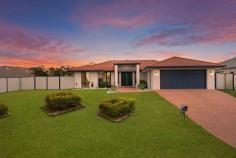 65 Rix Dr Upper Coomera QLD 4209 Coral Homes built and beautifully presented, this gracefully maintained
residence with large quantities of space and serenity, provides current
day comfort for relaxing and entertaining alike..
Conveniently located close to children's park, shops, dining and
entertainment, child care centre, medical centre and sought after
educational options including the Upper Coomera State College, Assisi
Catholic College, Saint Stephens Christian College and the Coomera
Anglican College.
An abundance of living options internally with:
* 5 bedrooms (or 4 plus games/TV room)
* Study/office
* Stunning, timeless formal lounge/dining
* Large rumpus room
* Family/meals room
* Spacious kitchen with gas cooking, walk-in pantry
* Huge masters retreat with ensuite and roomy walk-in robe
* DLUG and separate laundry
To compliment internally, this home boasts plenty externally:
* A 932sqm easement free block
* 26m street frontage with huge side access
* Flat, private, fenced rear yard for pool, pets and play
* Sensational 4 x 13m outdoor dining with pull-down blinds
* Majestic landscaping, vegetable patches, concrete edging
Other features include SOLAR POWER, stainless steel screen doors, new
carpet, colourbond fencing, skylights, air-conditioning in rumpus,
walk-in linen/storage and security system throughout..