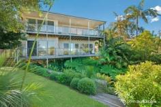 55 Grandview Crescent Killcare NSW 2257 FOR SALE: $2,400,000 Property Description Quintessential Beach House Beachside location, superb style and impressive garden combine to make this property one of Killcare’s finest. Morning paper on the deck, coffee in the village, strolls on unspoilt Killcare beach, alfresco dining with the view, sounds of the surf to lull you to sleep…….this is the place to relax and retreat. Perfectly designed with level access to the main living and master suite, with downstairs bedrooms, living and bathrooms for guests and family. Entertain with ease in the light filled living room that flows to the covered entertaining deck. The kitchen is finished to the highest standard including double oven, generous storage and stone benchtops. The professionally designed garden showcases a watercourse, tropical plantings, lawned area and secure fencing. Immerse yourself in the fabulous coastal lifestyle! Property Features Land Area 727.0 sqm